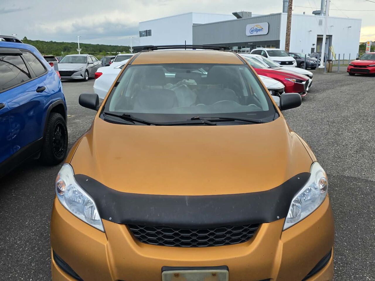 Orange 2010 Toyota Matrix Hatchback Front-Wheel Drive Manual