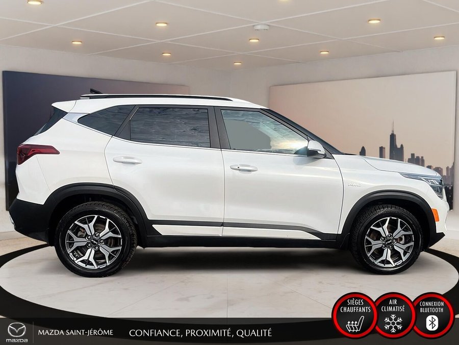 Kia Seltos EX Premium | TOIT OUVRANT | CUIR SOFINO | NAVIGATION | SIÈGES ÉLECTRIQUES | AWD 2023 Blanc