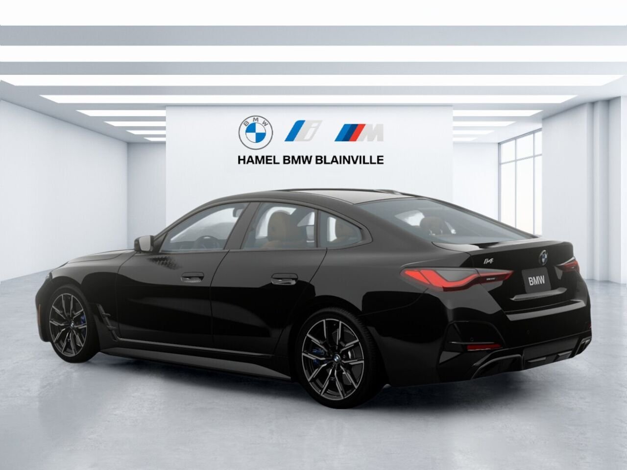 2026 BMW i4 xDrive40 Black Sapphire Metallic Blainville - photo #1
