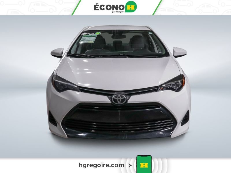 Toyota Corolla 2019 Blanc Laval - photo #1