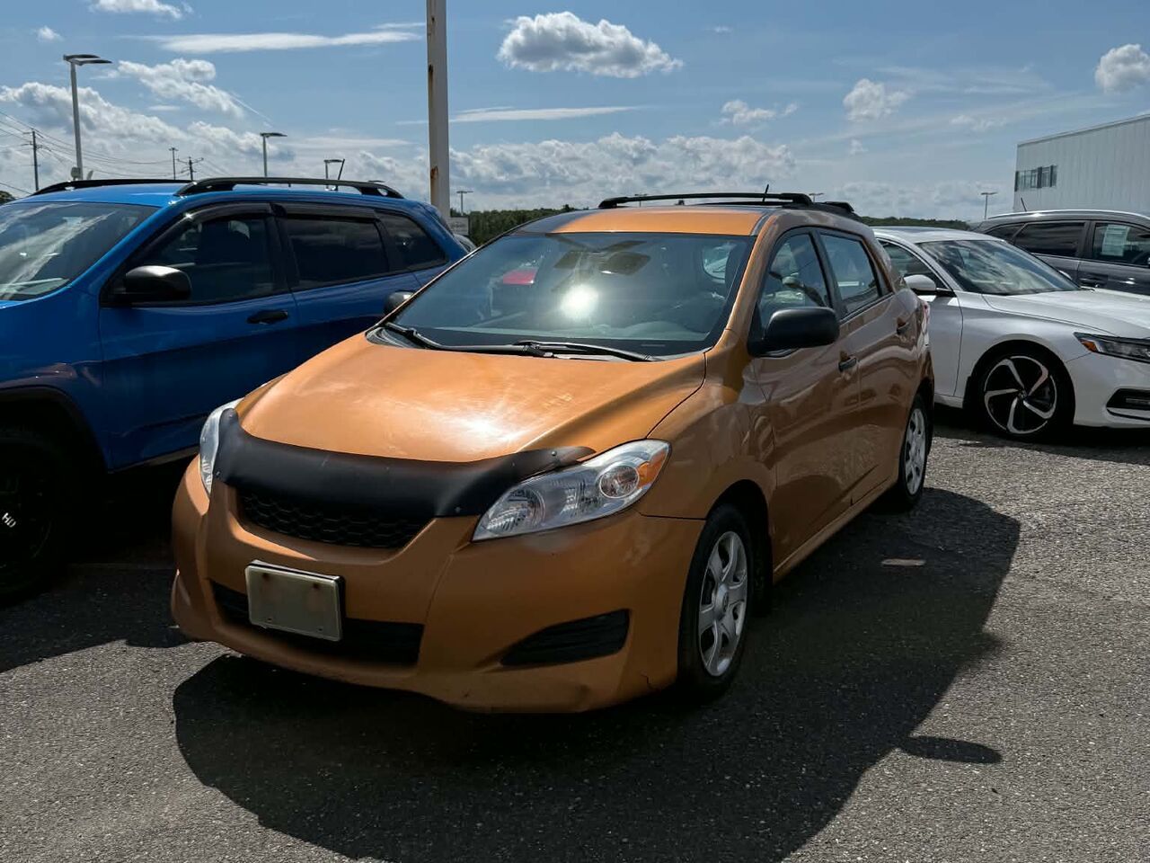Orange 2010 Toyota Matrix Hatchback Front-Wheel Drive Manual