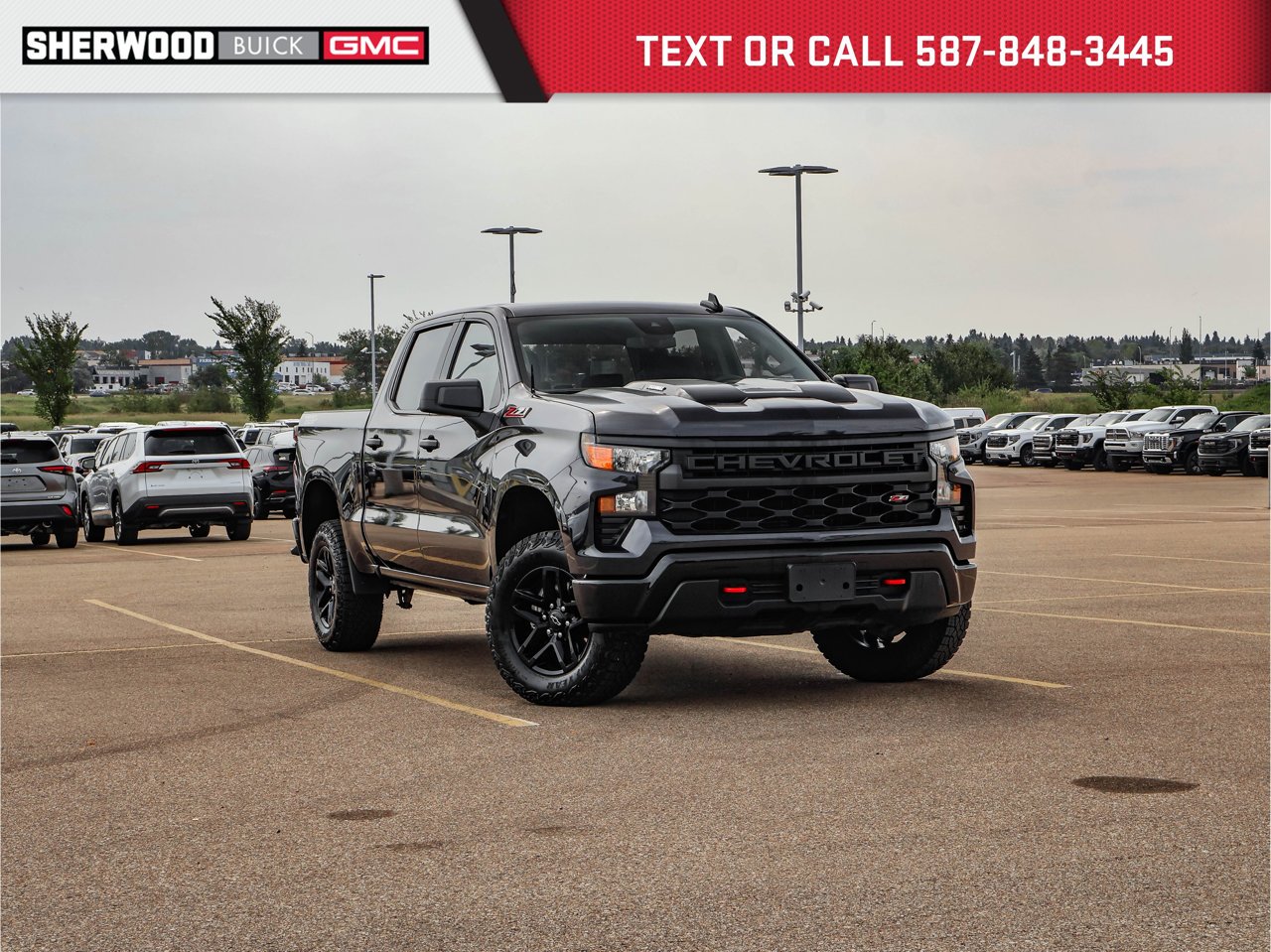 2024 Chevrolet Silverado 1500 4WD Crew Cab 147 Custom Trail Boss Grey Sherwood Park - photo #0