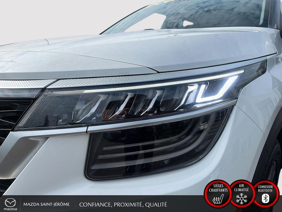 Kia Seltos EX Premium | TOIT OUVRANT | CUIR SOFINO | NAVIGATION | SIÈGES ÉLECTRIQUES | AWD 2023 Blanc