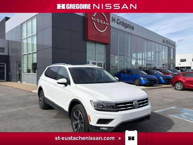 2021 Volkswagen Tiguan White Laval - photo #0