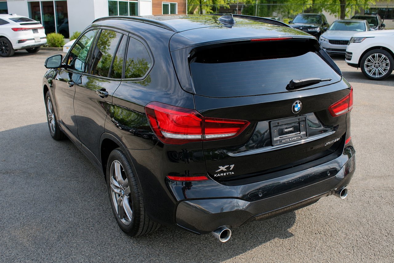 2021 BMW X1 VIN: WBXJG9C02M5T13773 Black Sainte-Rose - photo #2