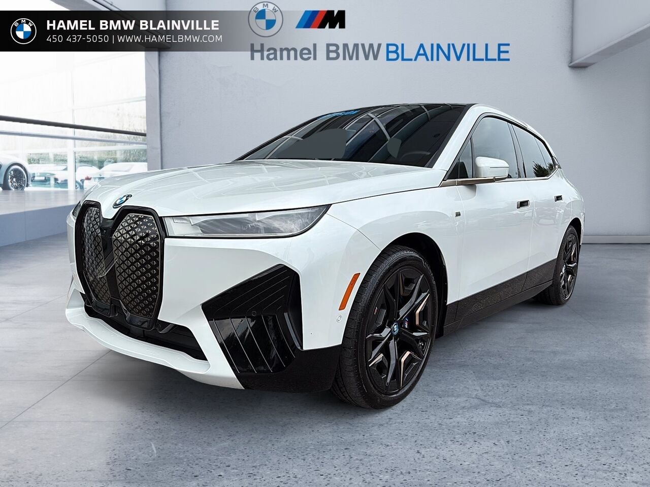 2024 BMW iX M60 xDrive véhicule d'activités sportives White Blainville - photo #0