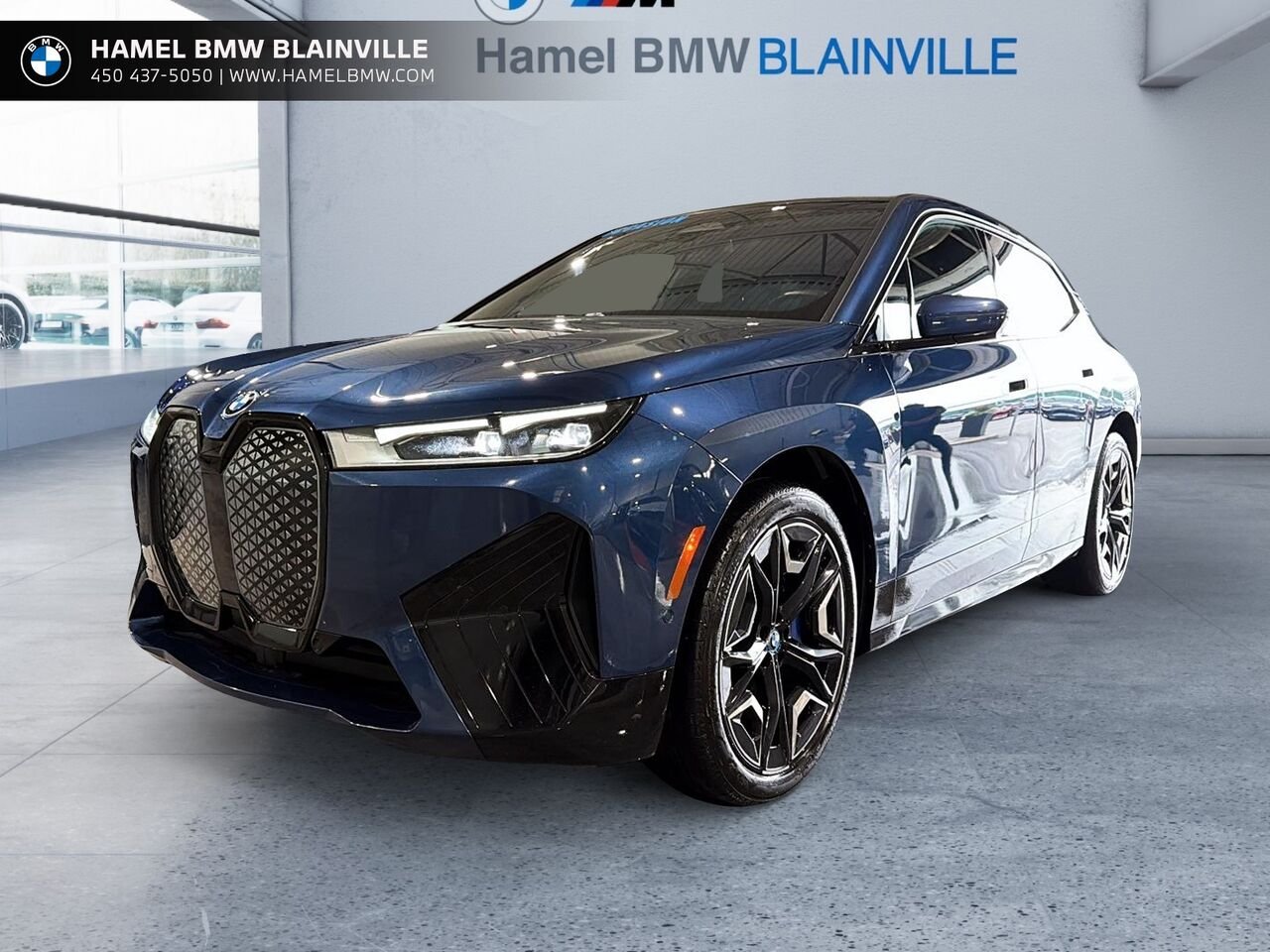 2024 BMW iX xDrive40 véhicule d'activités sportives Blue Blainville - photo #0