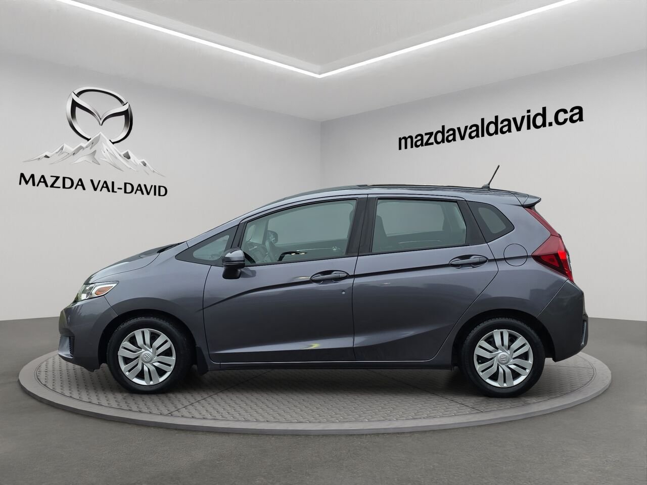 2016 Honda Fit LX à hayon 5 portes CVT, caméra de recul, sièges chauffant, commande audio au volant Grey Val-David - photo #1